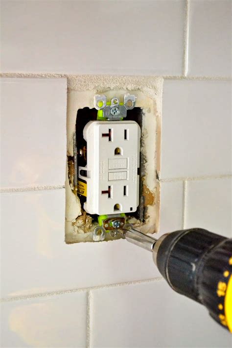 electrical box too low tile|loose outlet after tiling.